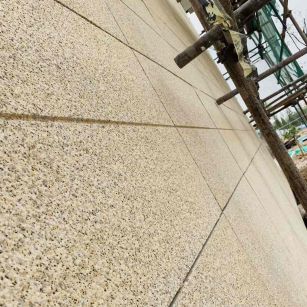 七台河 黄金麻花岗岩荔枝面外墙干挂石材效果示例