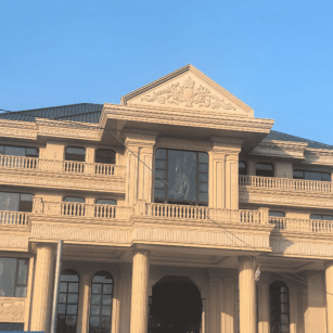 七台河黄金麻别墅外墙干挂石材效果示例