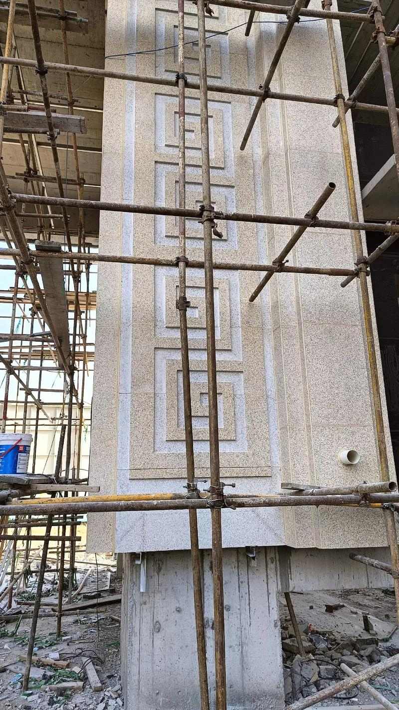 七台河 黄金麻花岗岩别墅外墙干挂回纹造型效果