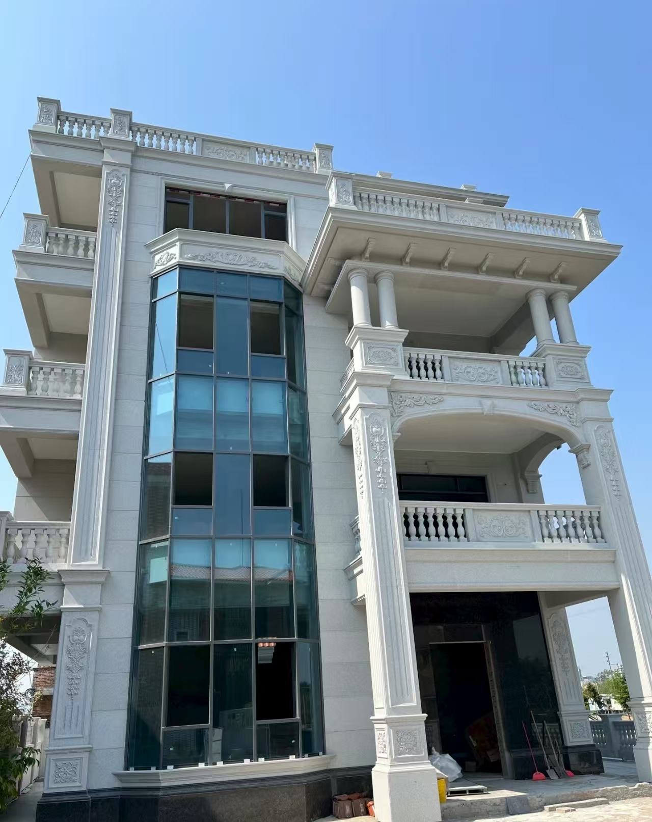 七台河 白麻花岗岩别墅外墙干挂效果展示