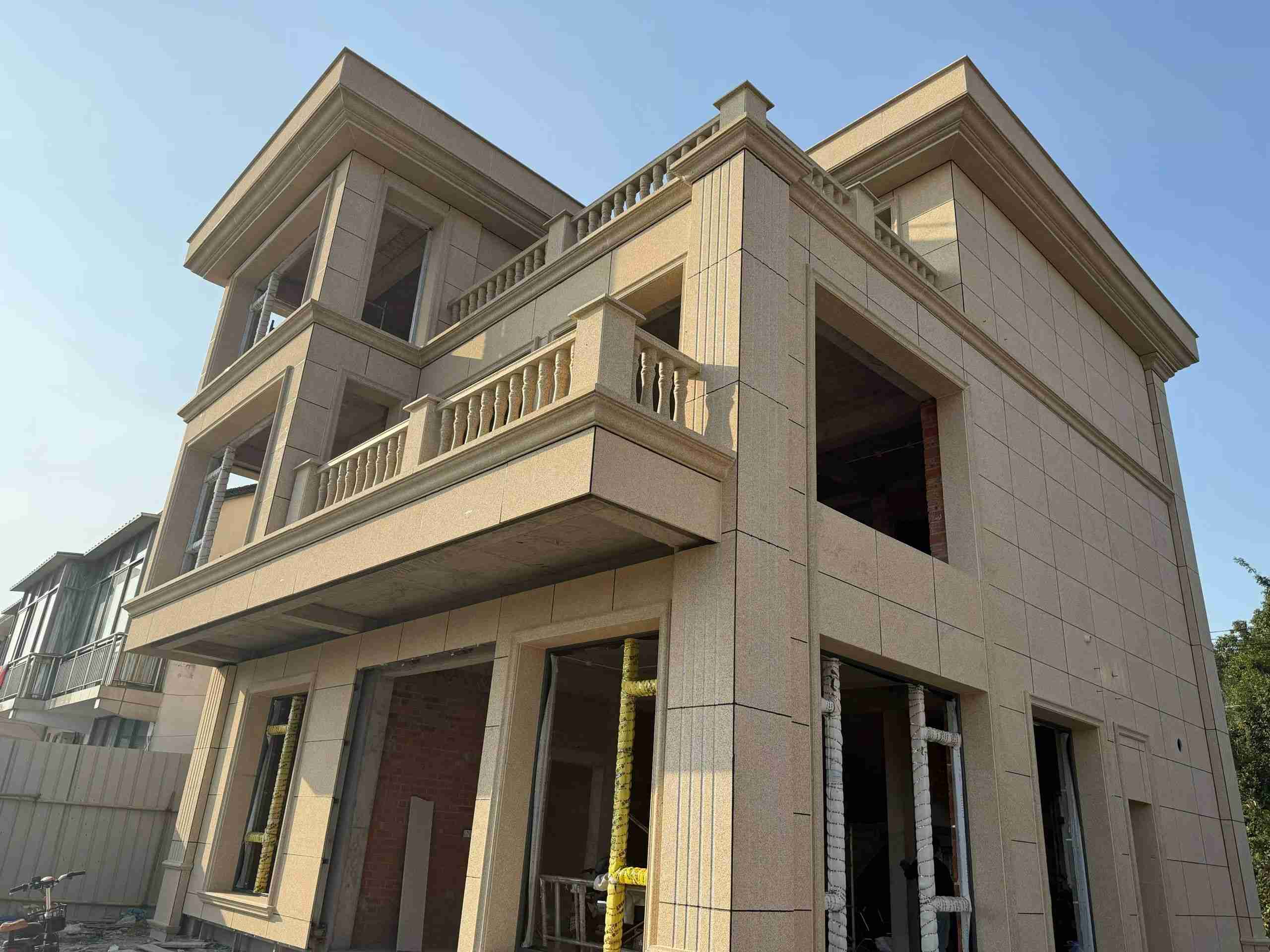 七台河 黄金麻花岗岩石材荔枝面外墙干挂效果展示