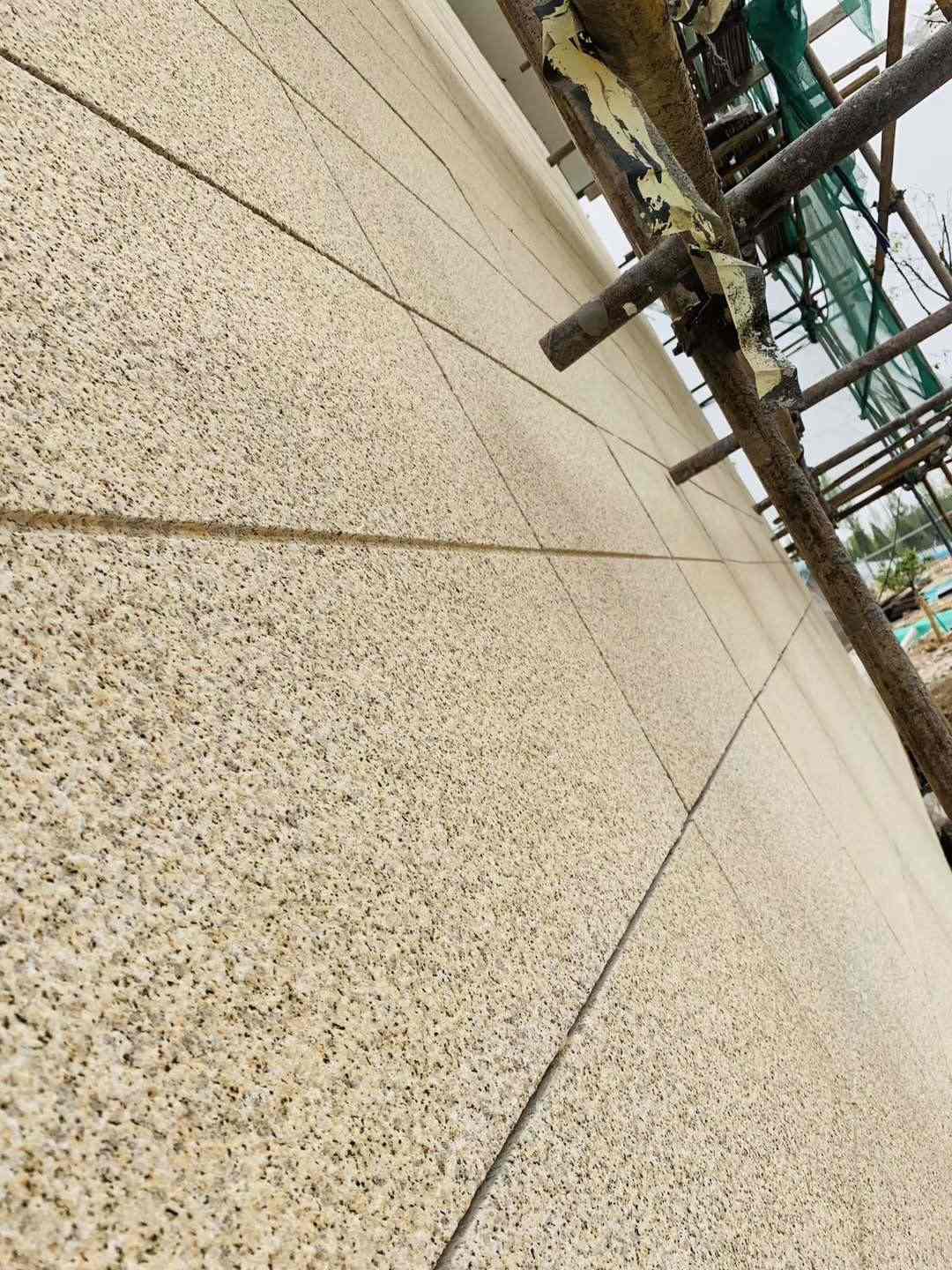 七台河 黄金麻花岗岩荔枝面外墙干挂石材效果示例